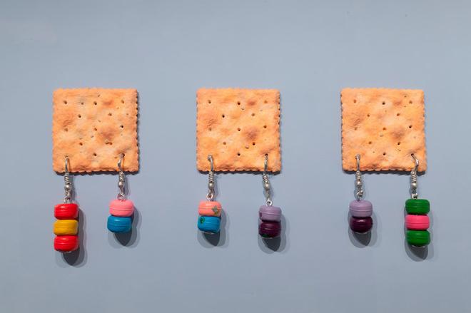 snack crackers with beads hanging off them